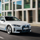 A photo of a white BMW i4 electric sedan.